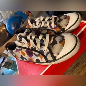 Coach shoes women’s size 10. A little worn but still in good condition.